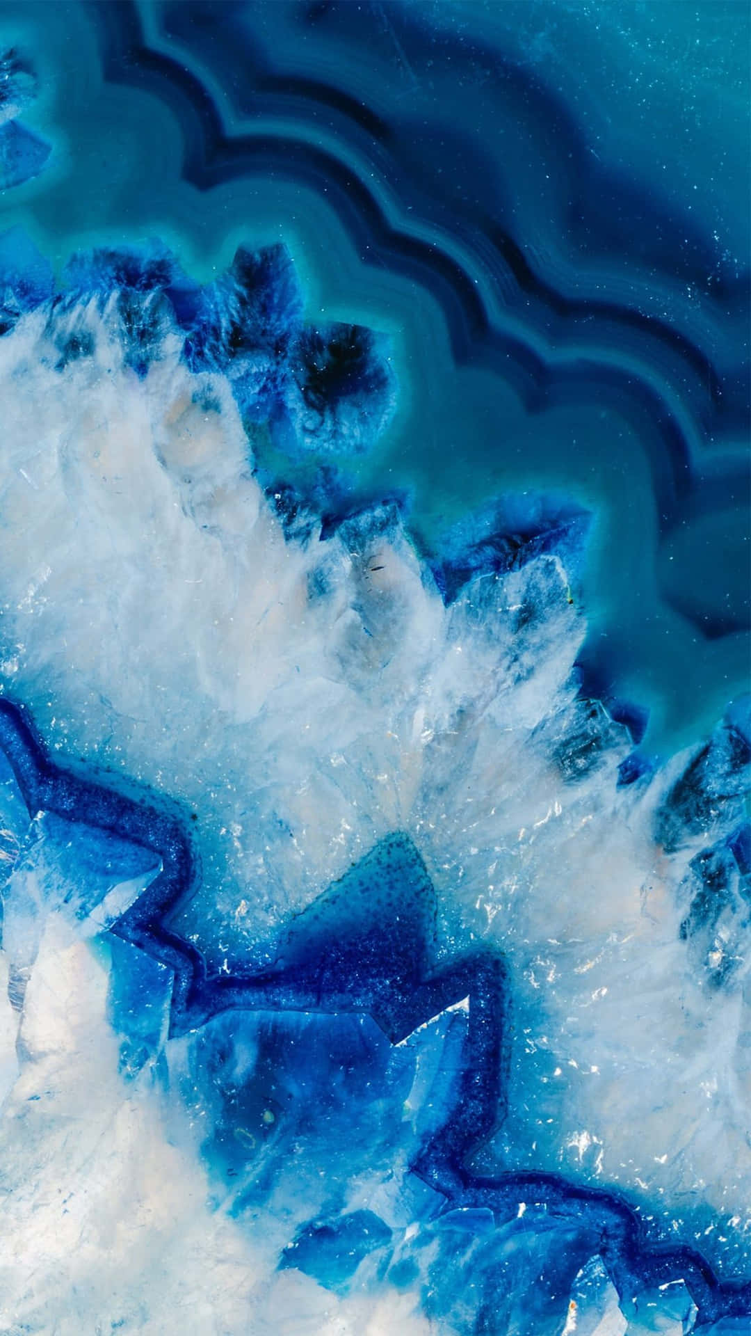 A Blue And White Agate In The Water Background