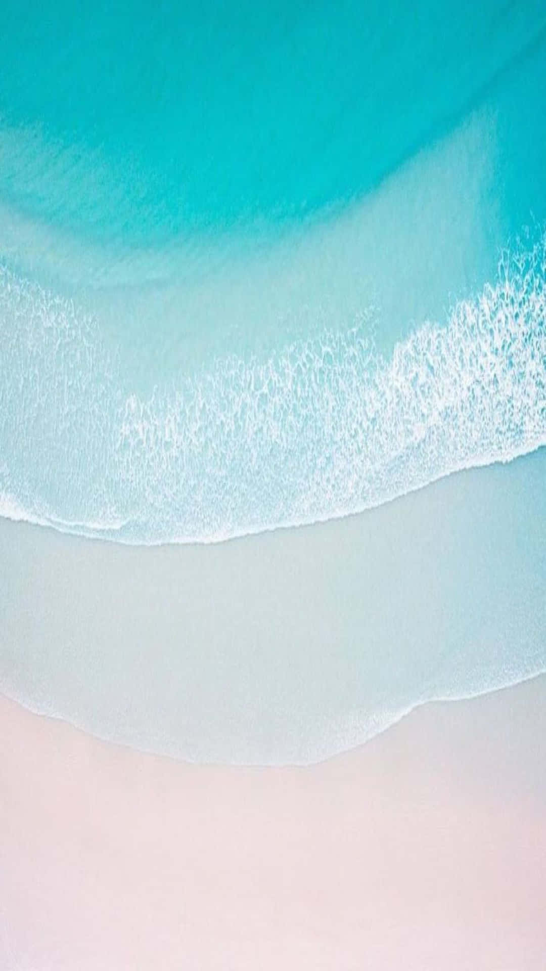 A Blue And White Beach With Waves