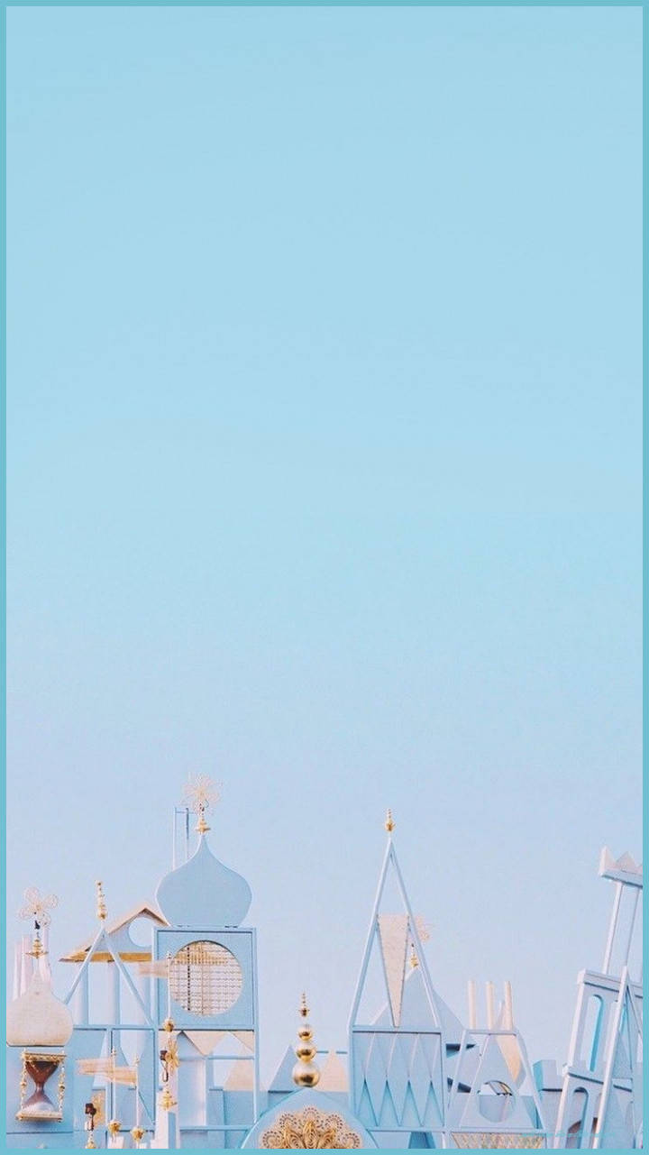 A Blue And White Building With A Blue Sky Background