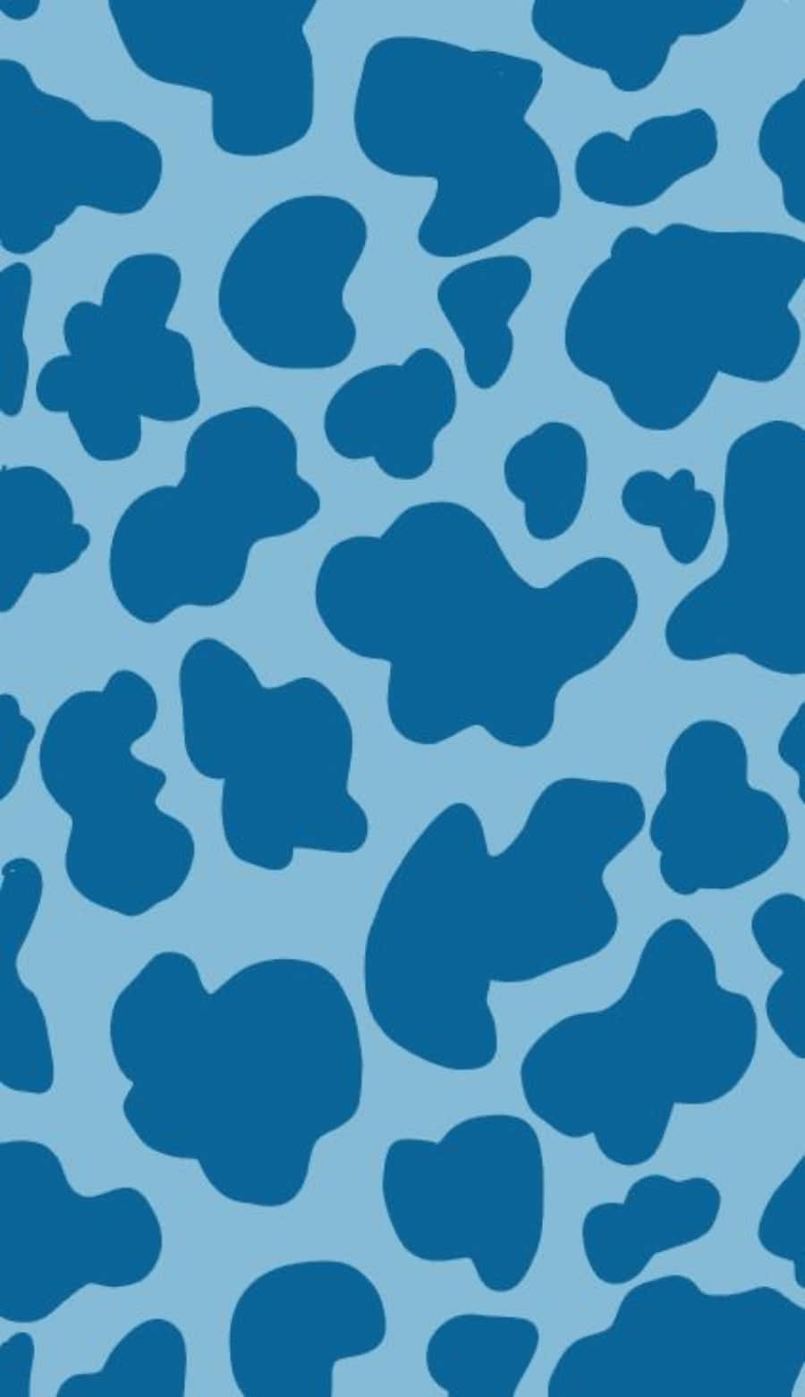 A Blue And White Cow Print Pattern Background