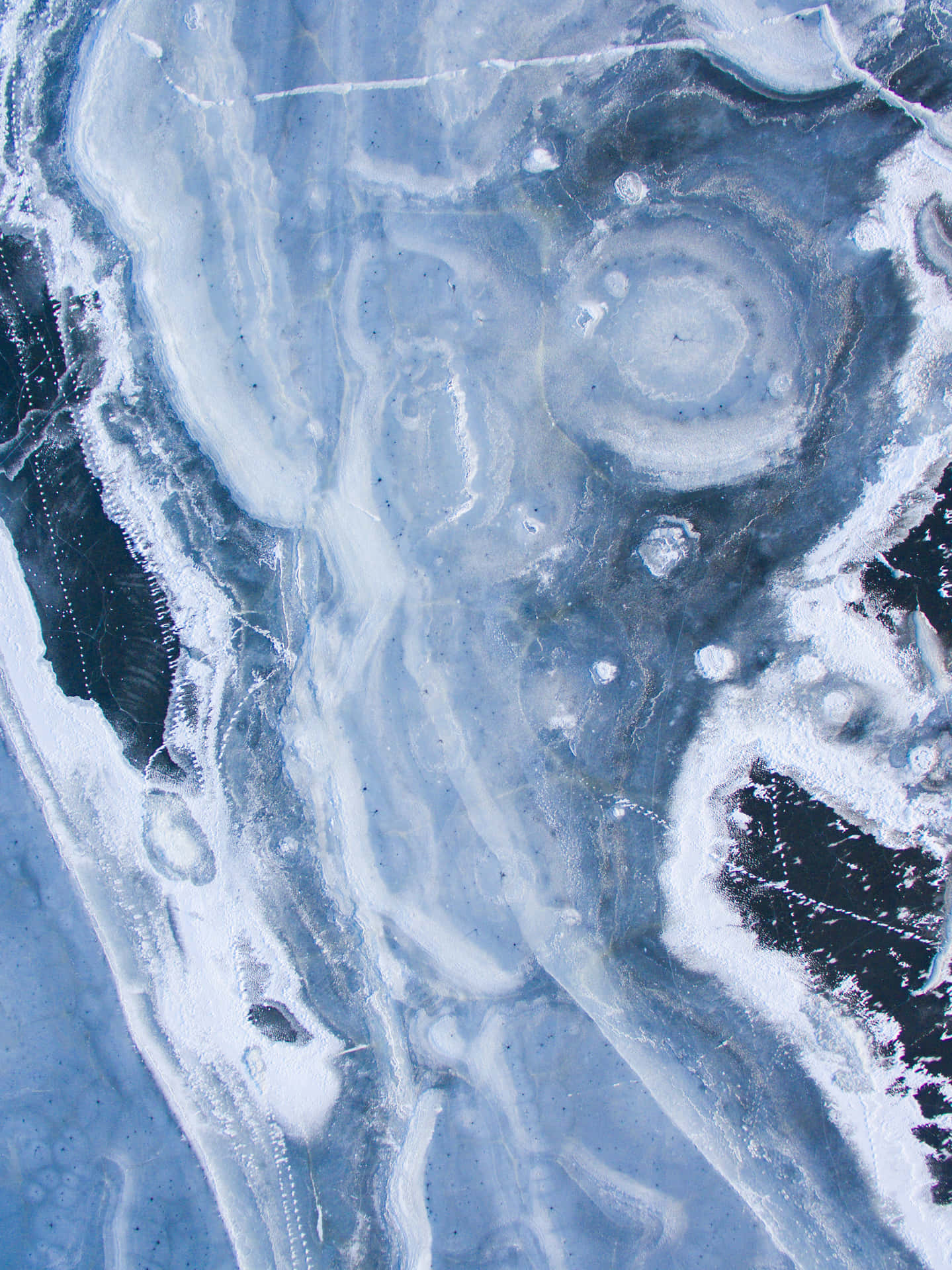 A Blue And White Ice Covered Area Background