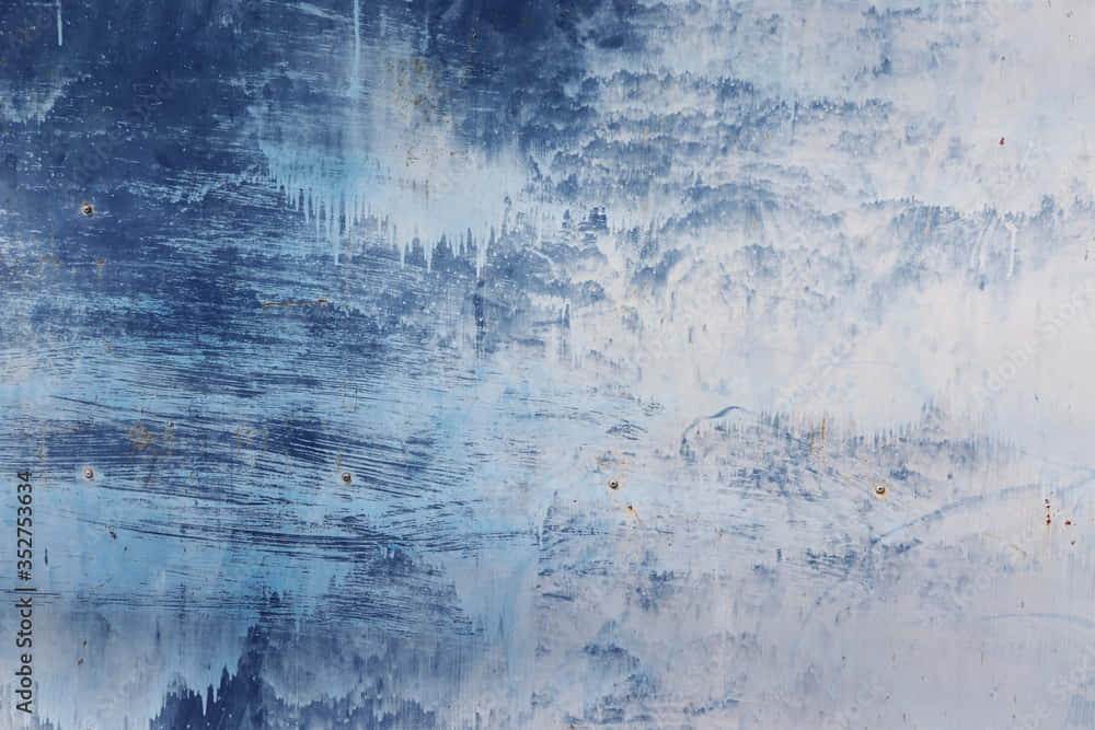 A Blue And White Painted Wall With A White Background Background