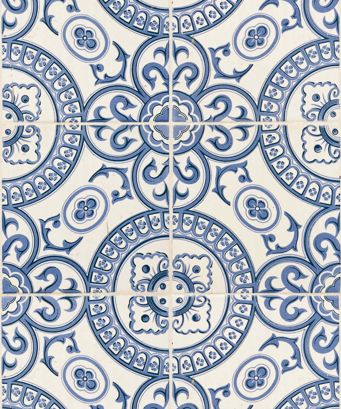 A Blue And White Tile With A Circular Design Background