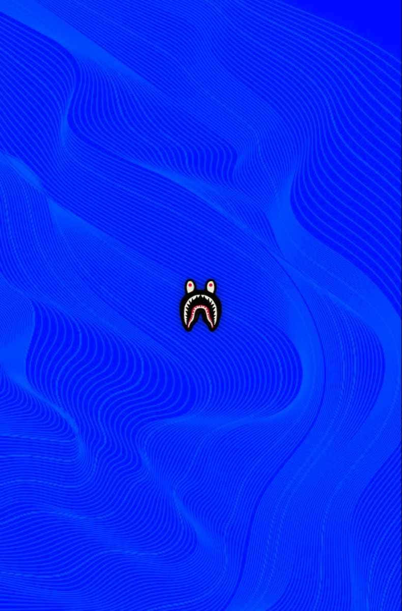 A Blue Background With A Black Face On It Background