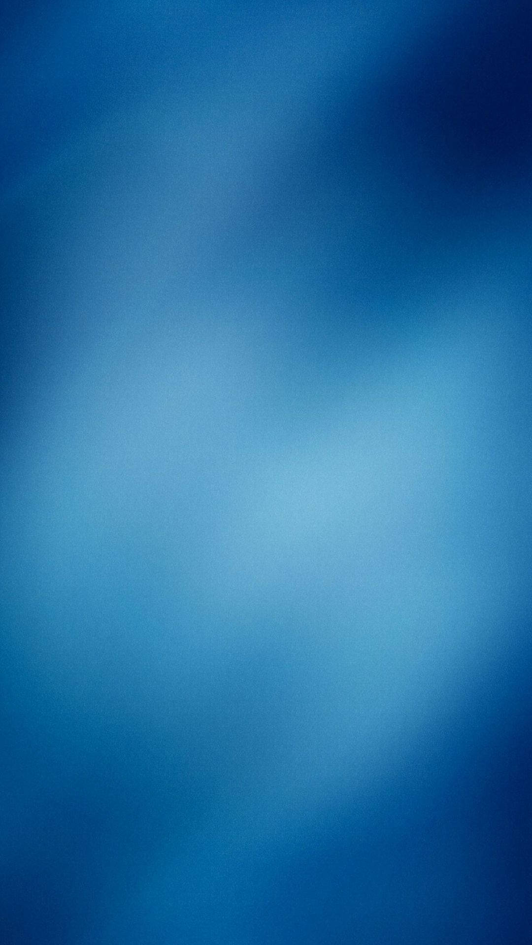 A Blue Background With A Blurred Background Background