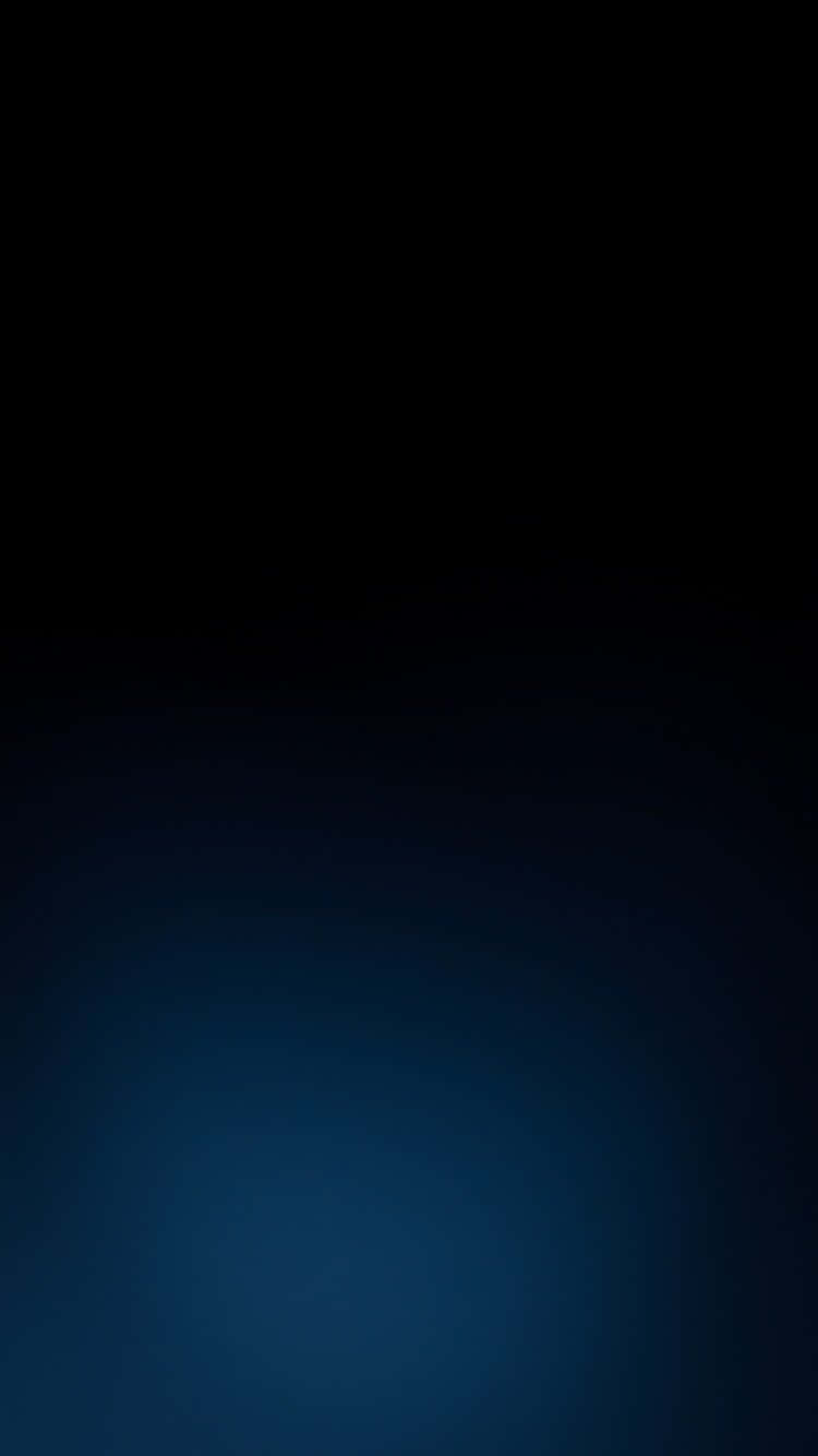 A Blue Background With A Light Shining On It Background