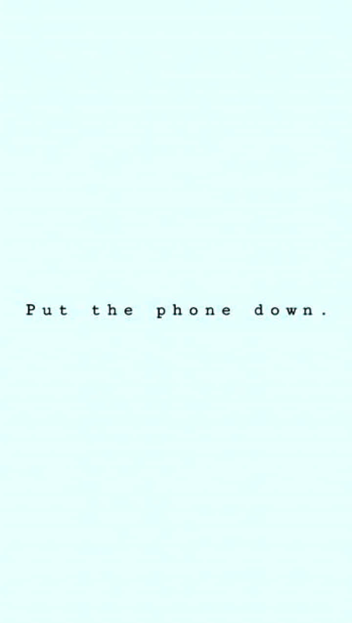 A Blue Background With The Words Put The Phone Down Background