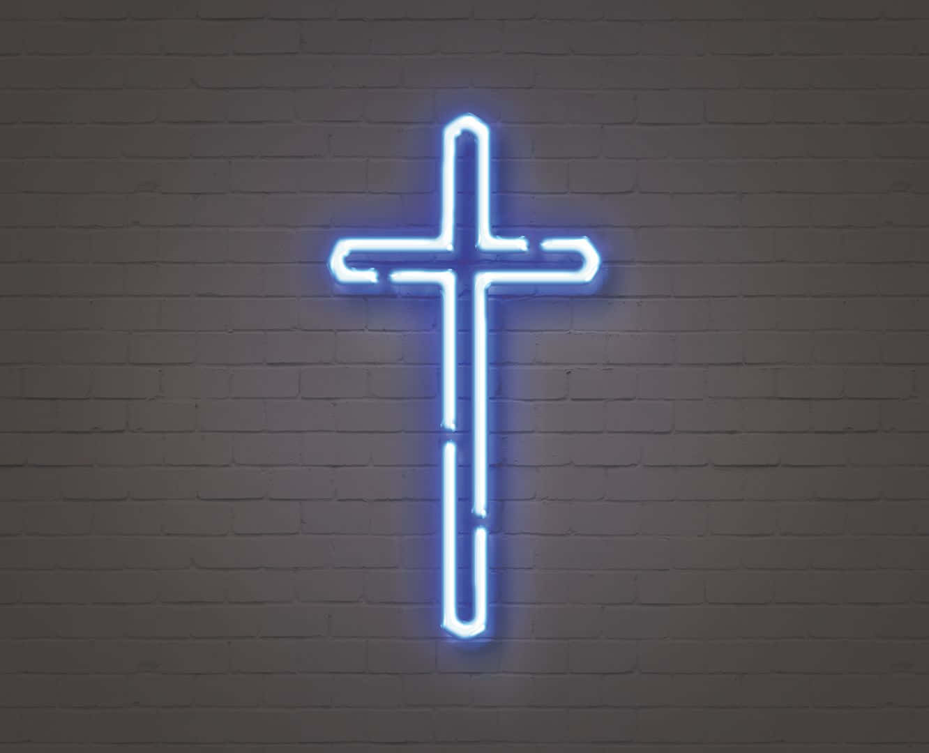 A Blue Neon Cross On A Brick Wall Background