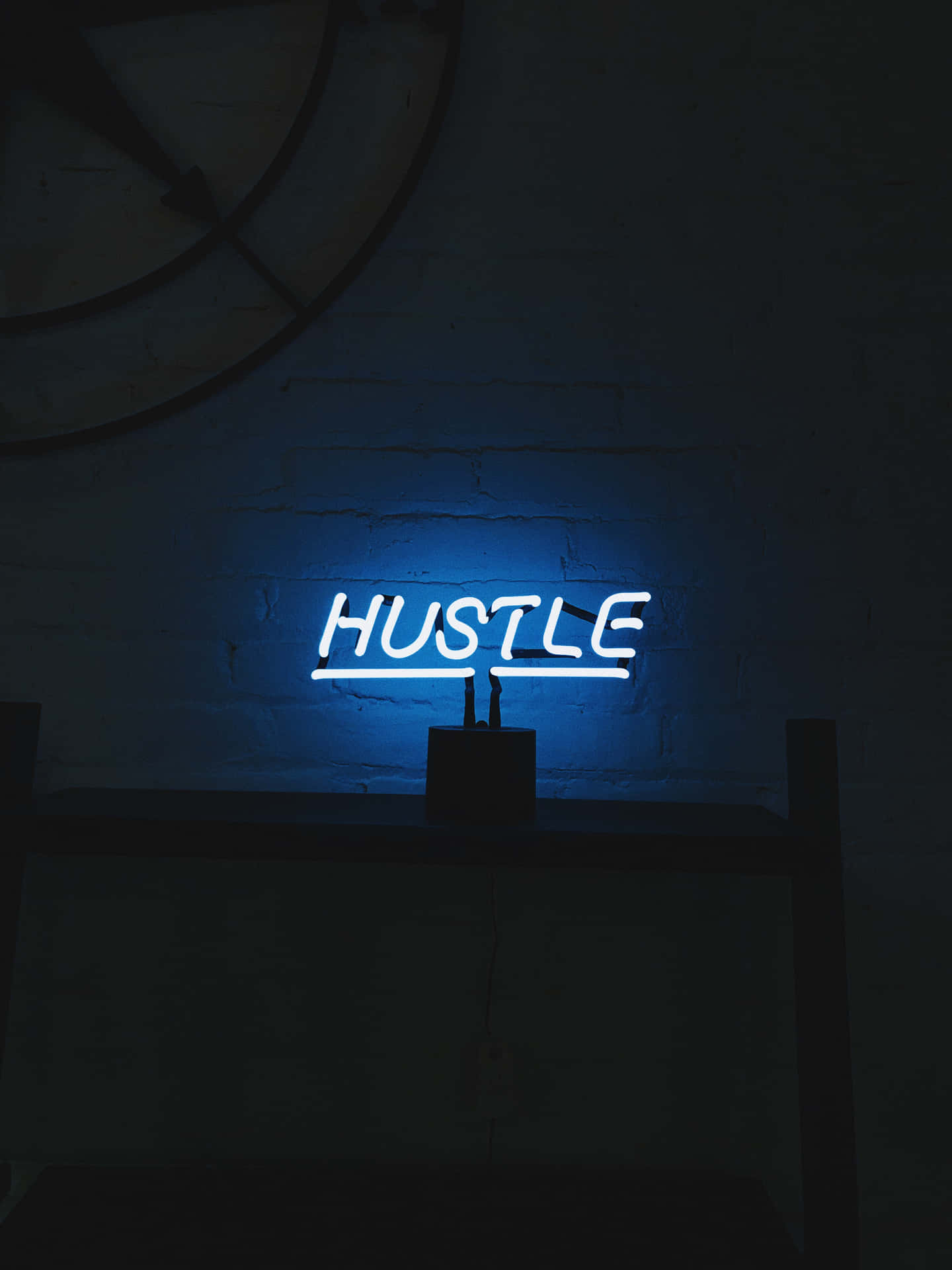 A Blue Neon Sign With The Word Hustle On It Background