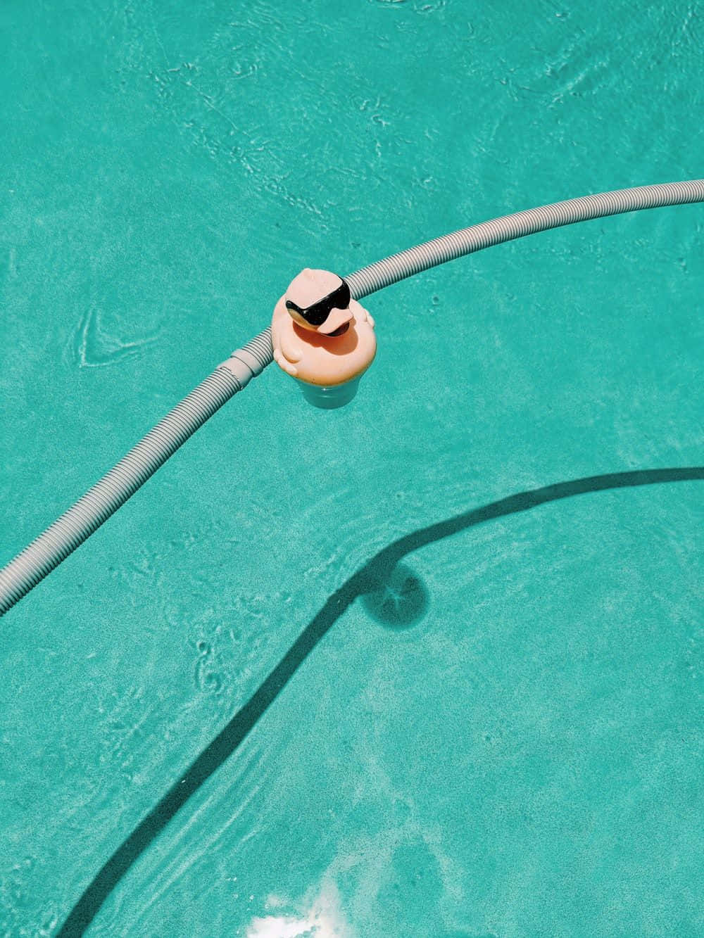 A Blue Pool With A Blue Hat