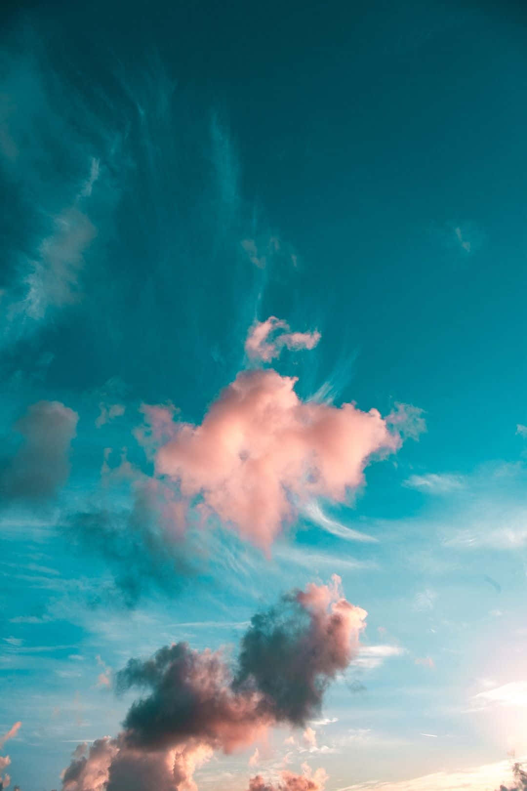 A Blue Sky With Clouds And A Boat Background