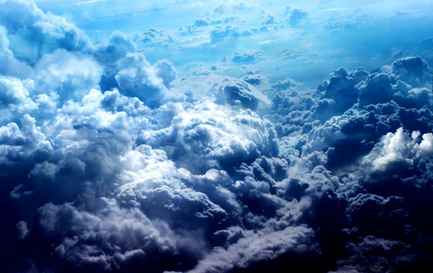 A Blue Sky With Clouds In The Background