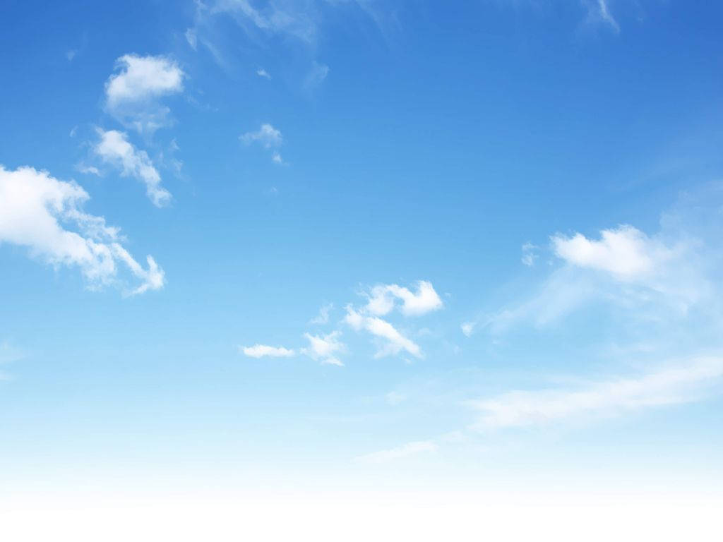 A Blue Sky With White Clouds Background