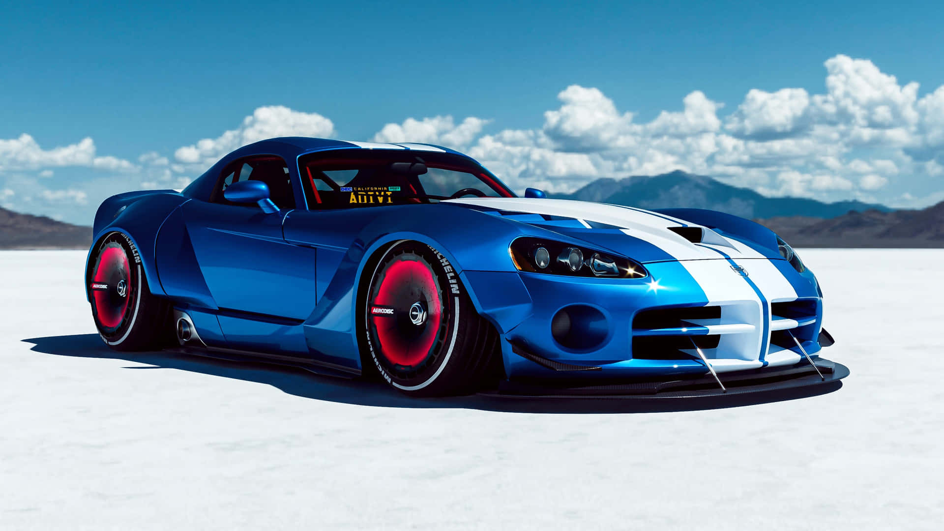 A Blue Sports Car On The Desert Background