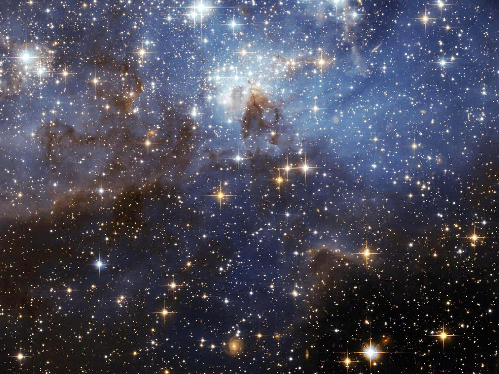 A Blue Star Cluster With Stars In The Background Background