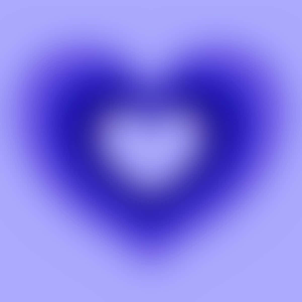 A Blurred Heart Shaped Image On A Purple Background Background