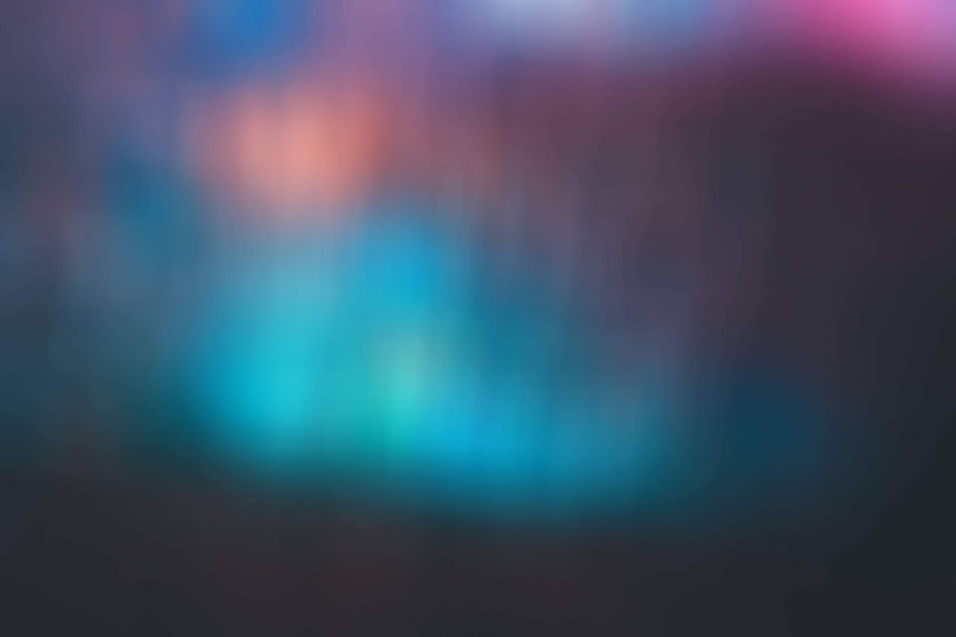 A Blurry Background With Colorful Lights Background