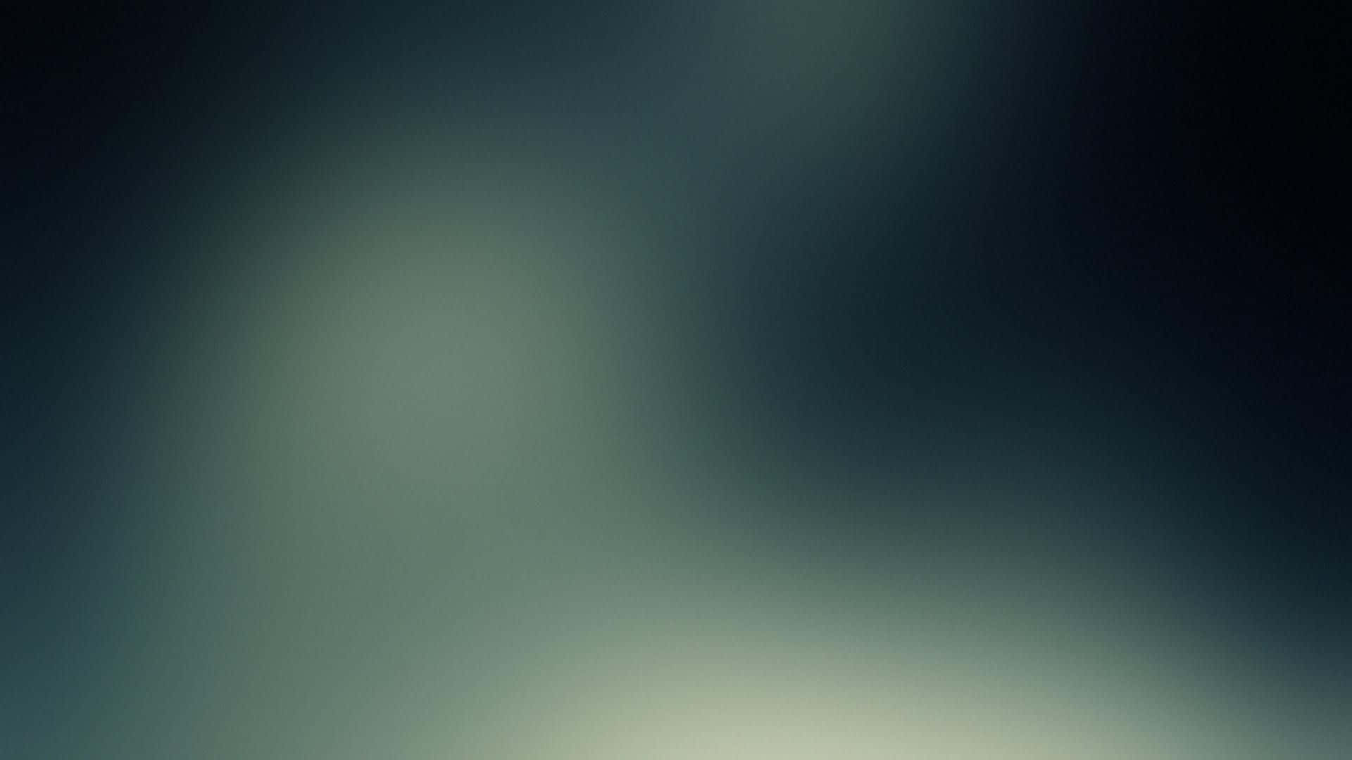 A Blurry Image Of A Green And Blue Iphone Background