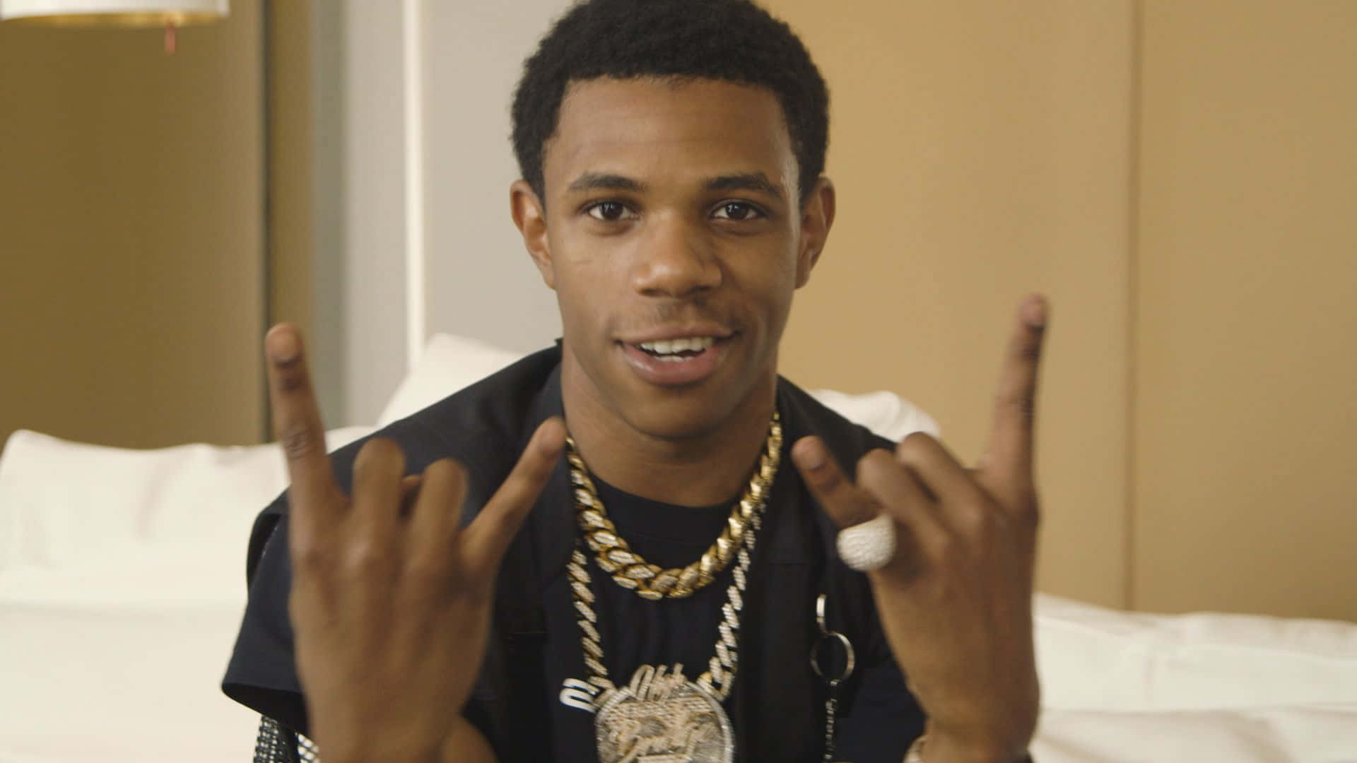 A Boogie Wit Da Hoodie Captures His Dramatic Style On Stage Background