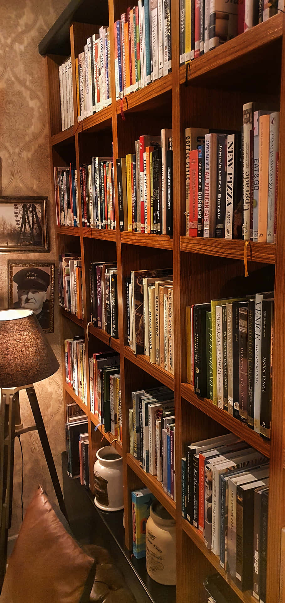 A Book Shelf With Books On It Background