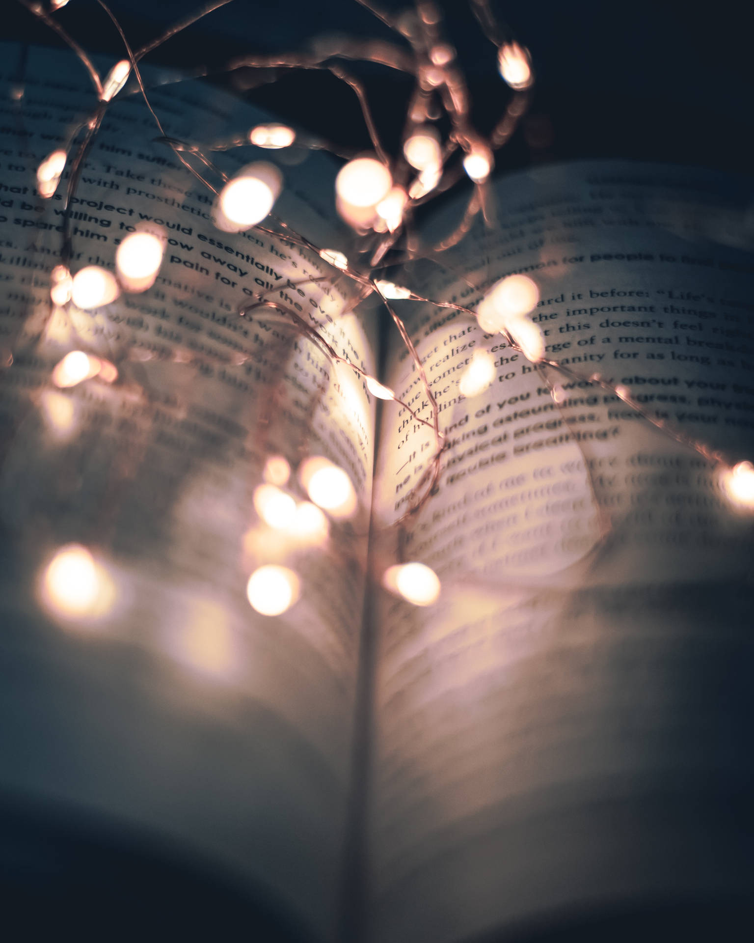 A Book With Lights On It Background