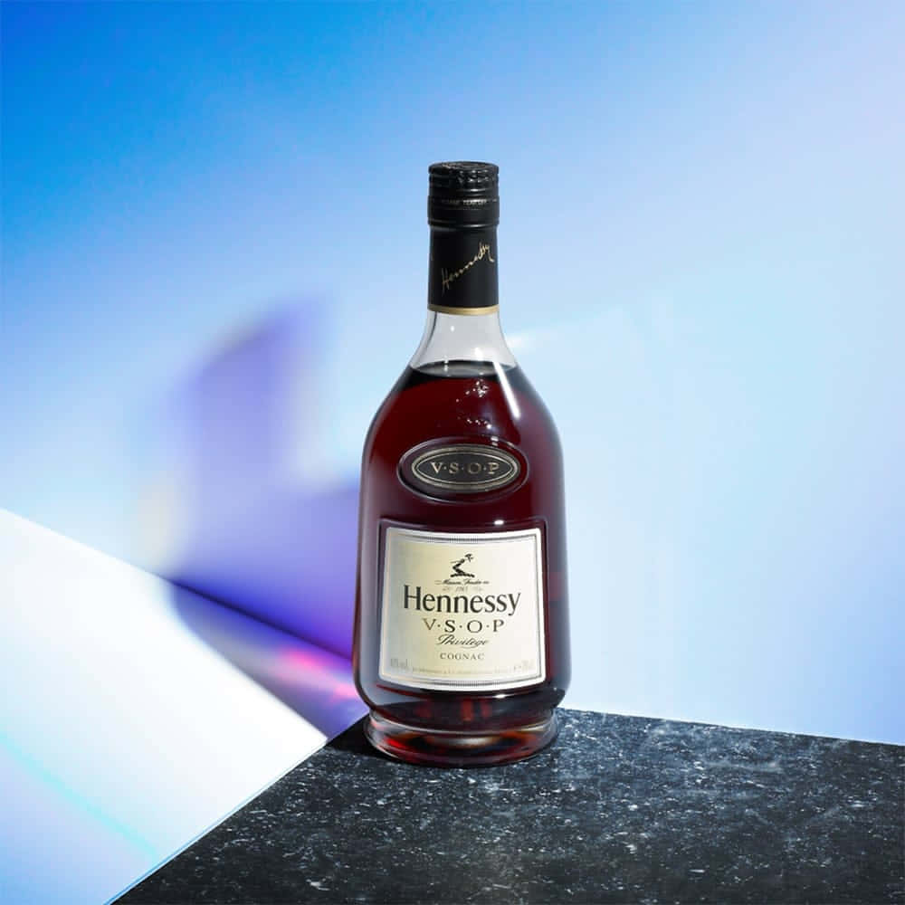 A Bottle Of Heverley Scotch Sitting On A Table Background