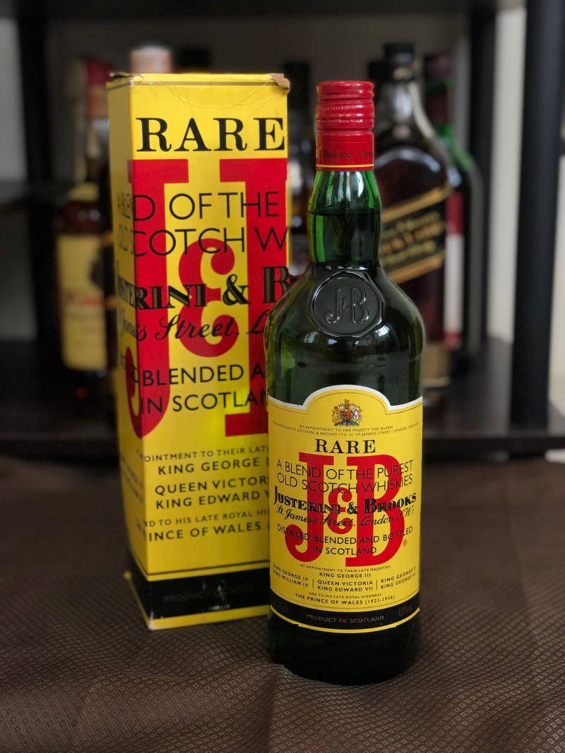 A Bottle Of J&b Rare Scotch Blended Whisky Background