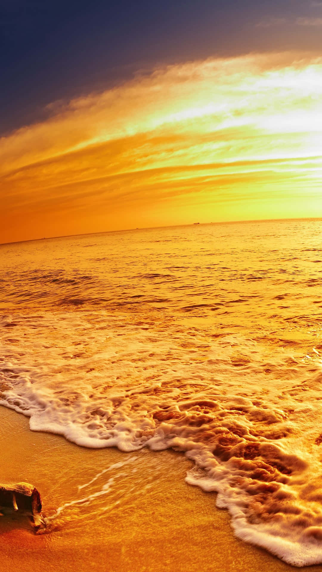 A Bottle On The Beach At Sunset Background