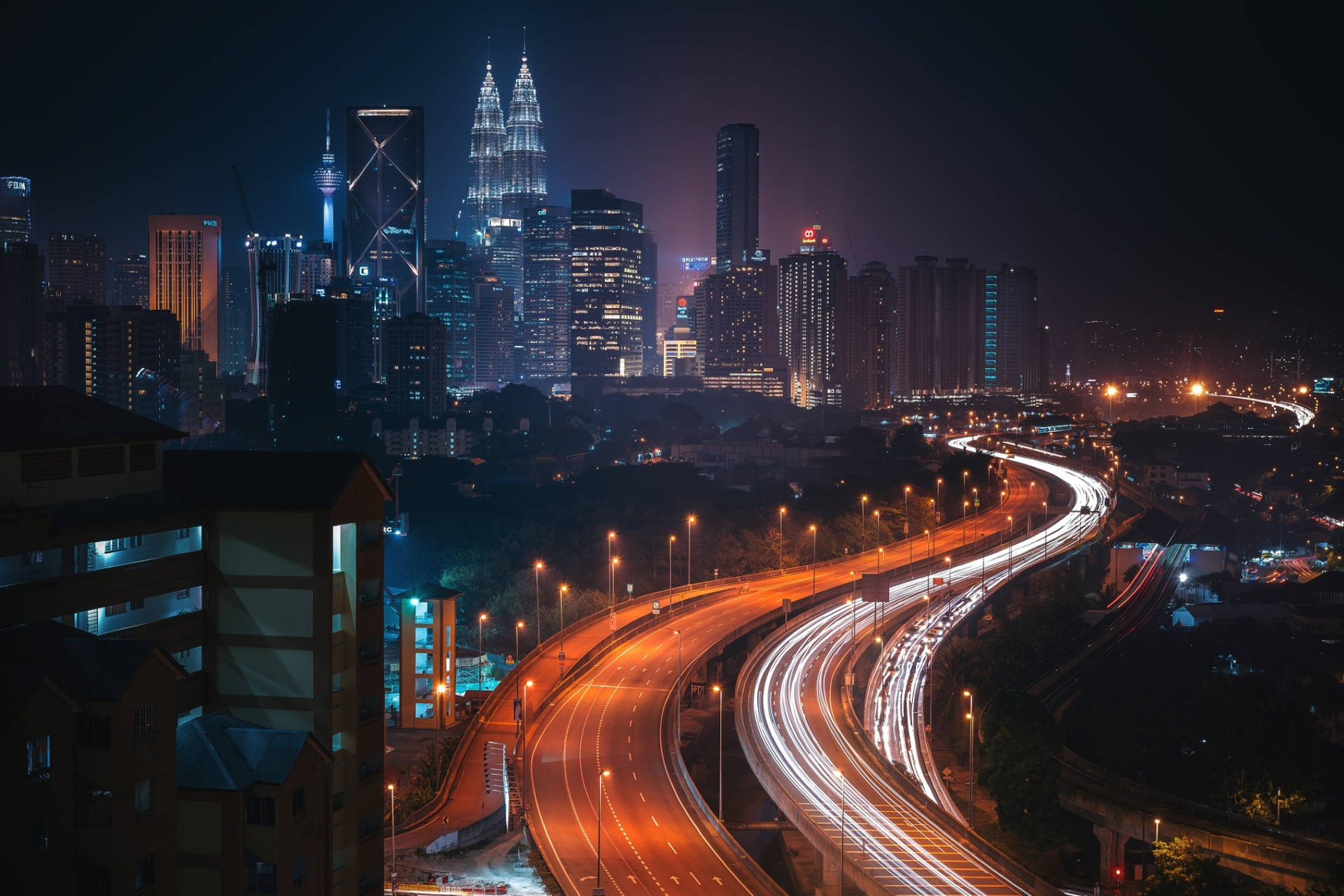 A Breathtaking View Of Kuala Lumpur's City Lights. Background