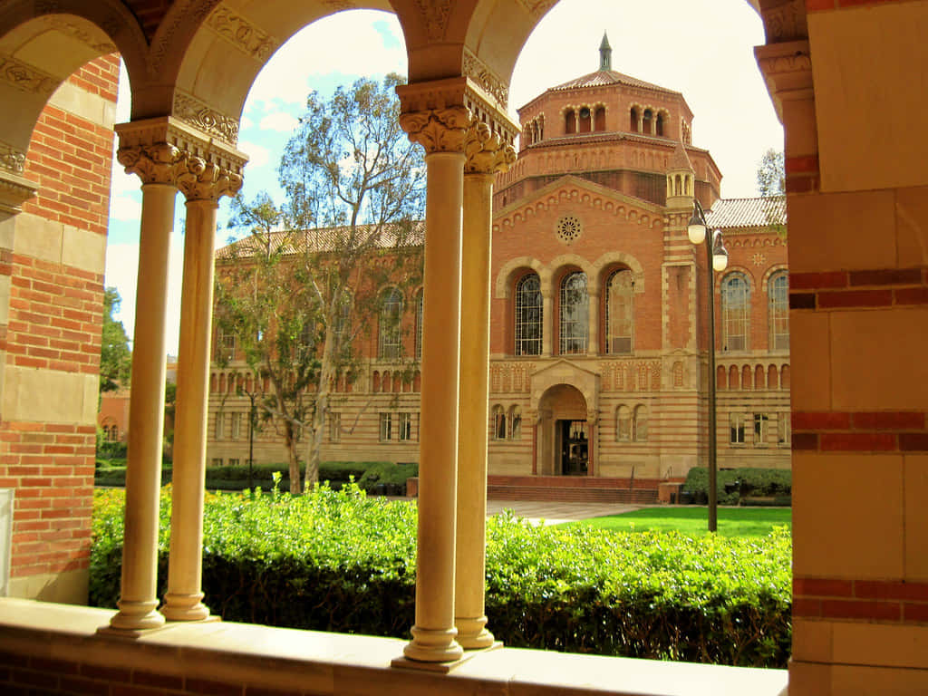 A Brick Building With Arches Background