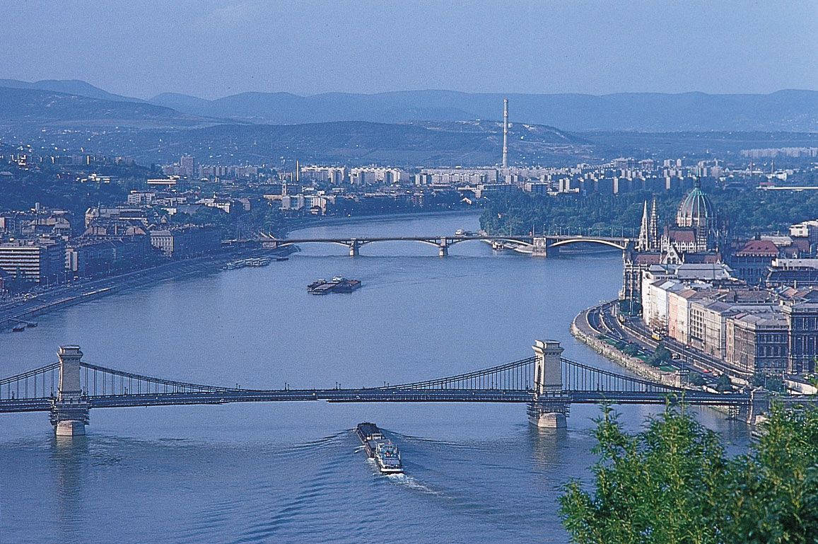 A Bridge Is Crossing The River Background