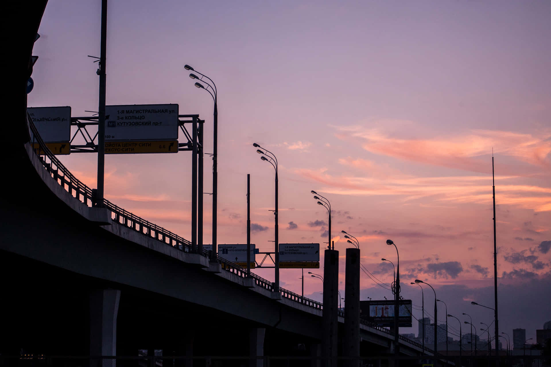 A Bridge With A Sign Background