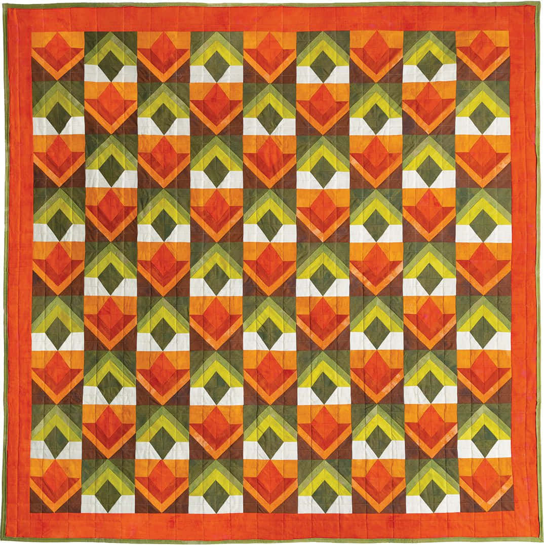 A Bright And Colorful Quilt Made With Patchwork Technique Background