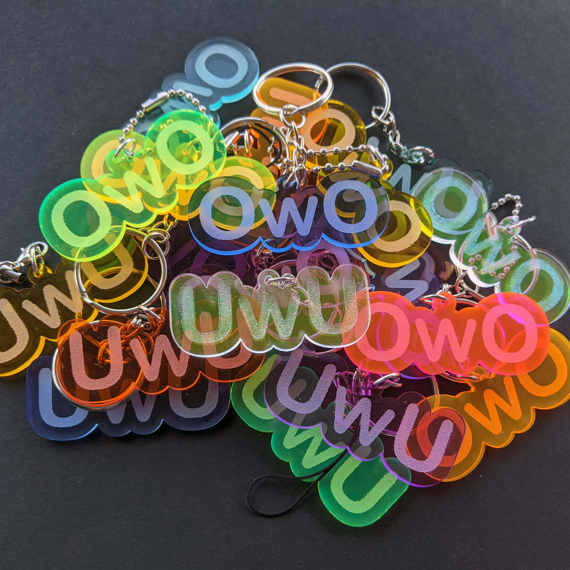 A Bunch Of Colorful Keychains Background