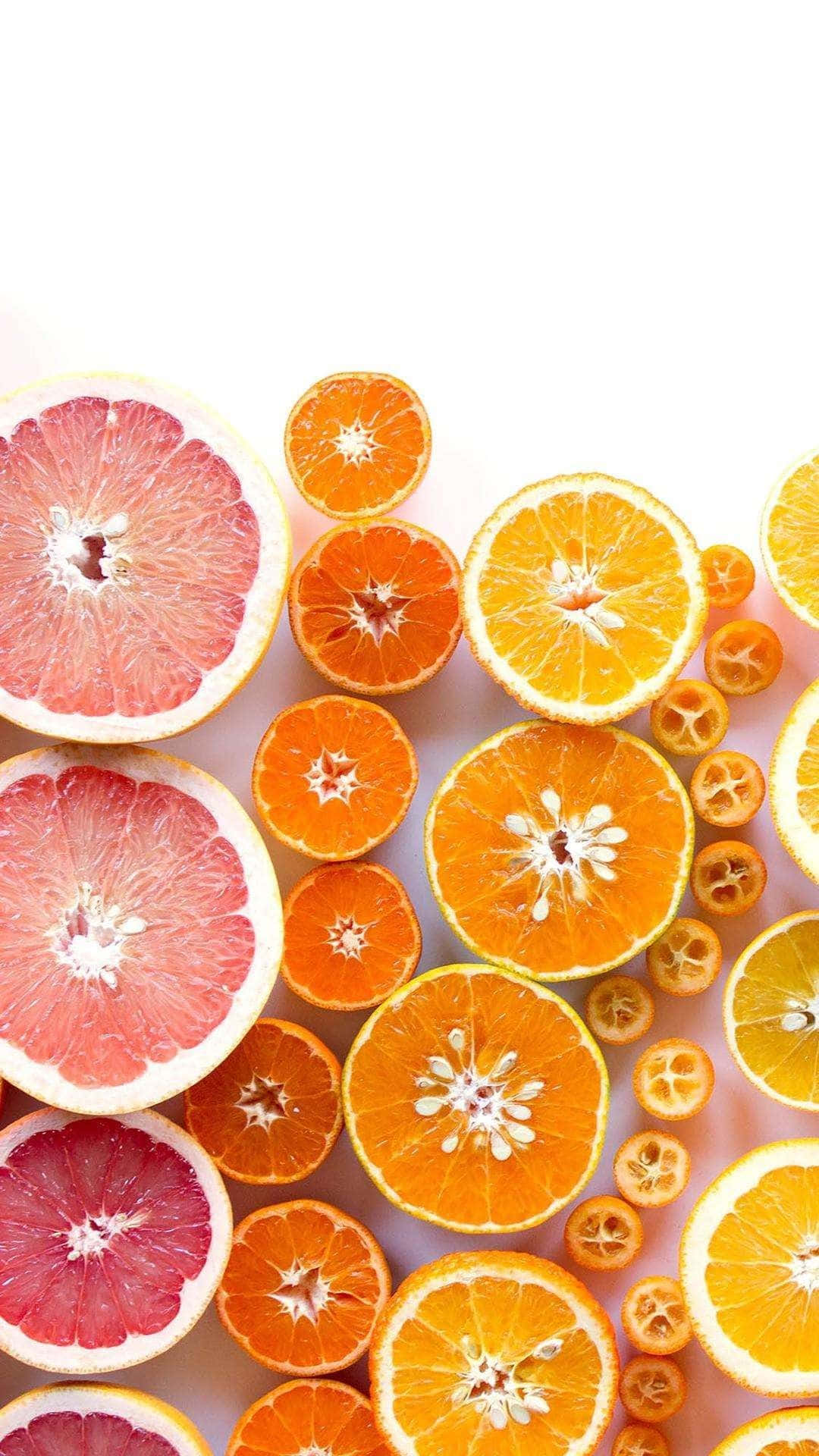 A Bunch Of Oranges And Grapefruits