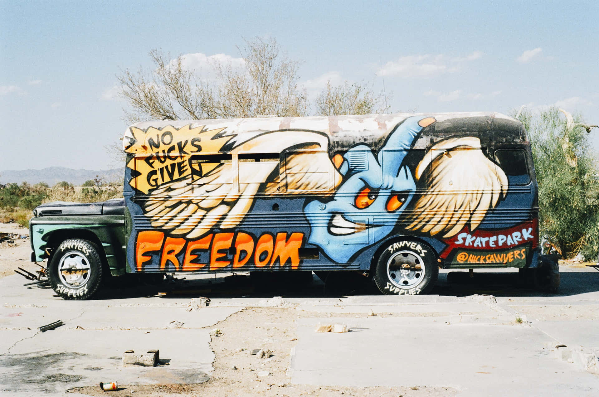 A Bus With Graffiti On It Background