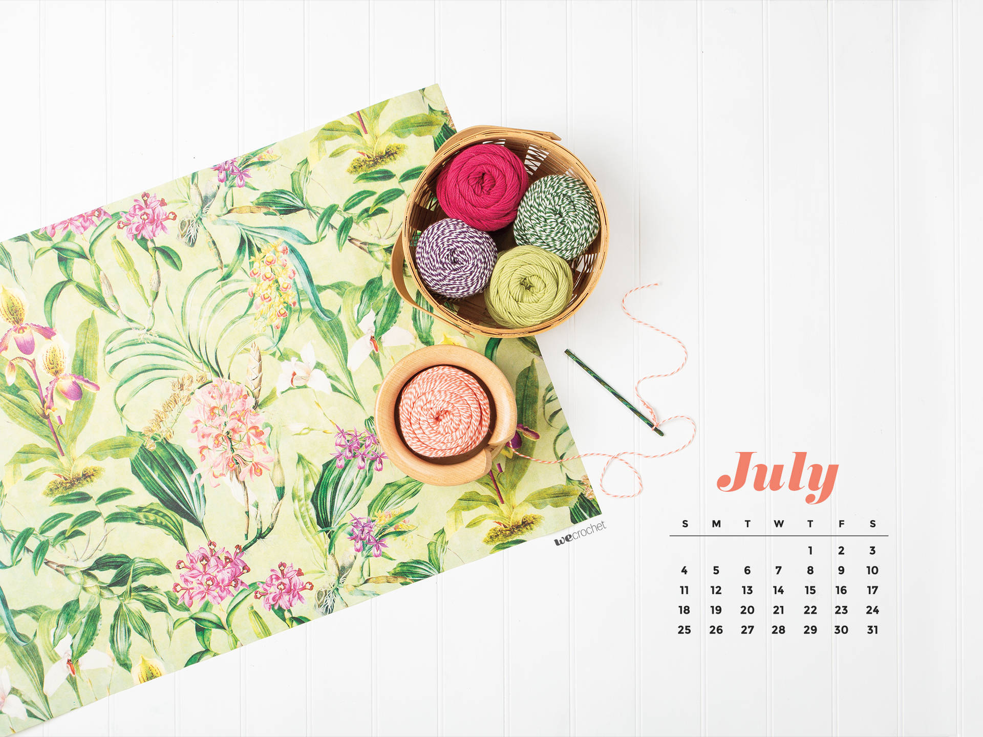 A Calendar With A Flower Pattern And Yarn