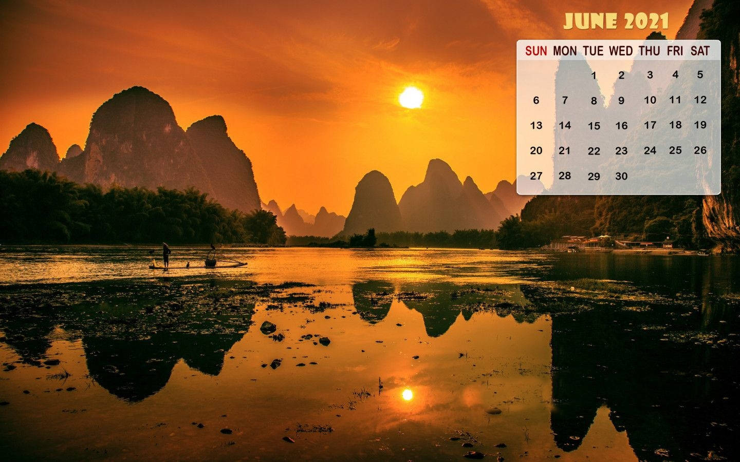 A Calendar With Mountains And A Sunset