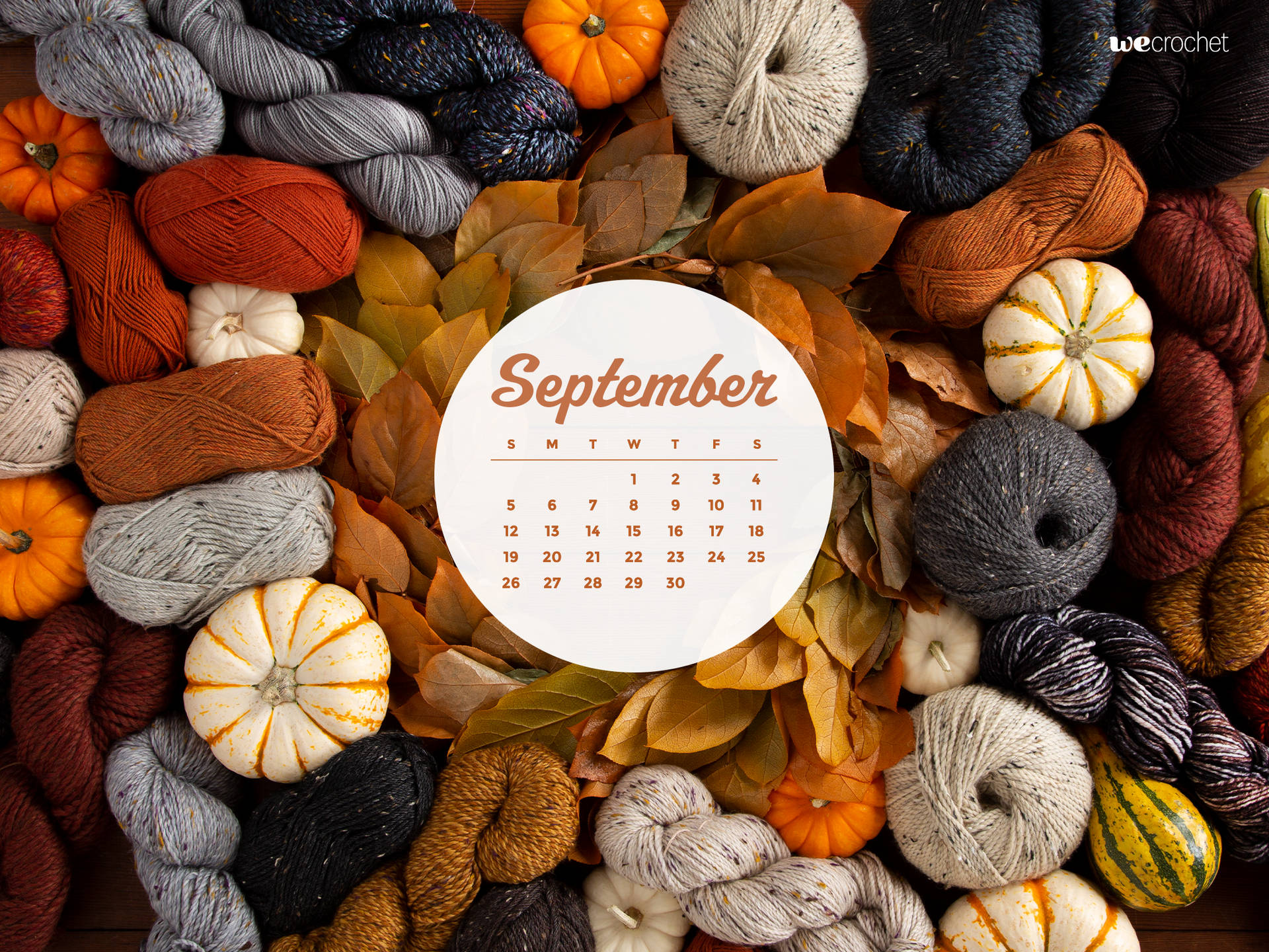 A Calendar With Yarn And Pumpkins Background