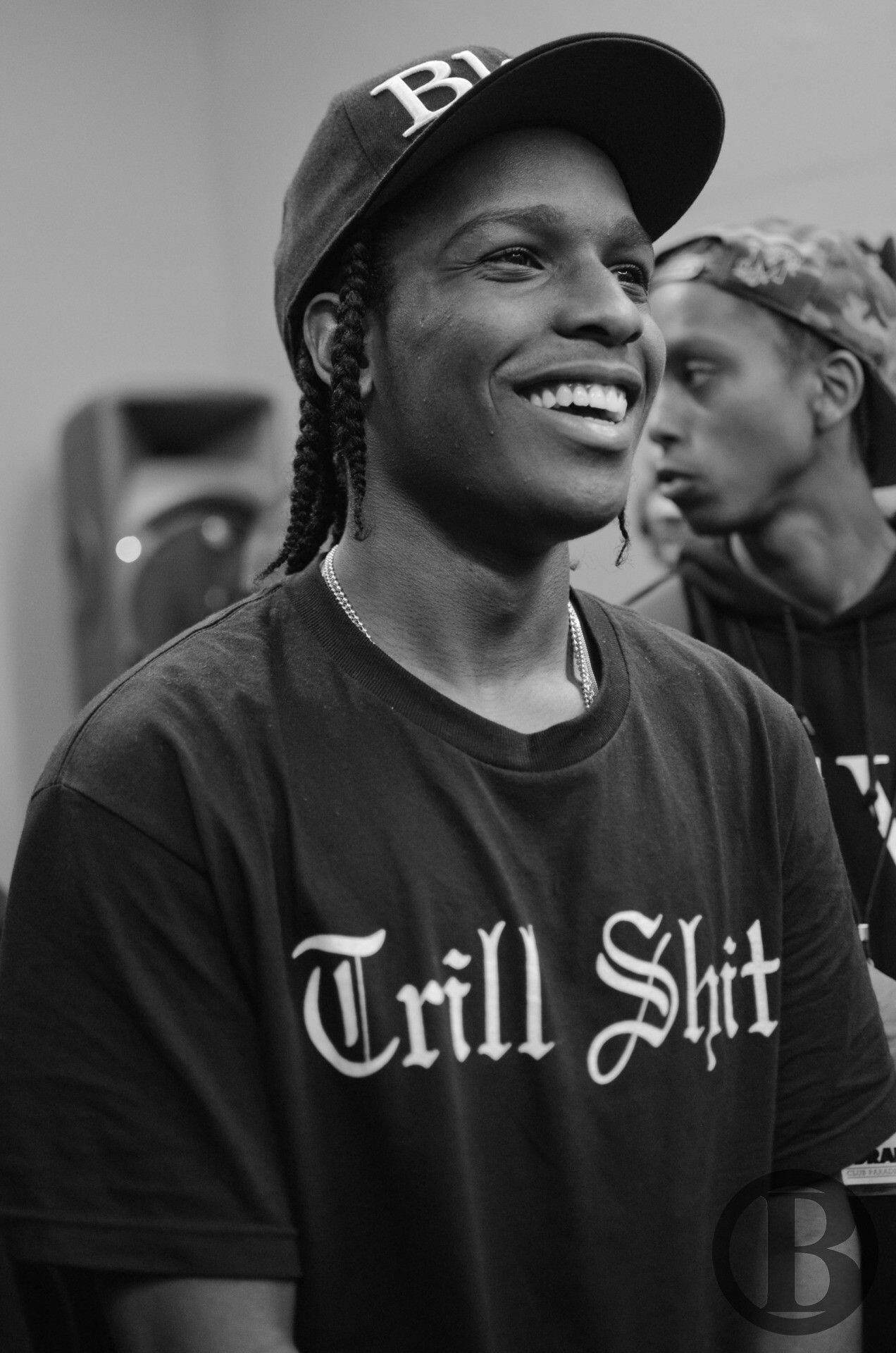A Candid Photo Of Asap Rocky Looking Dashing. Background