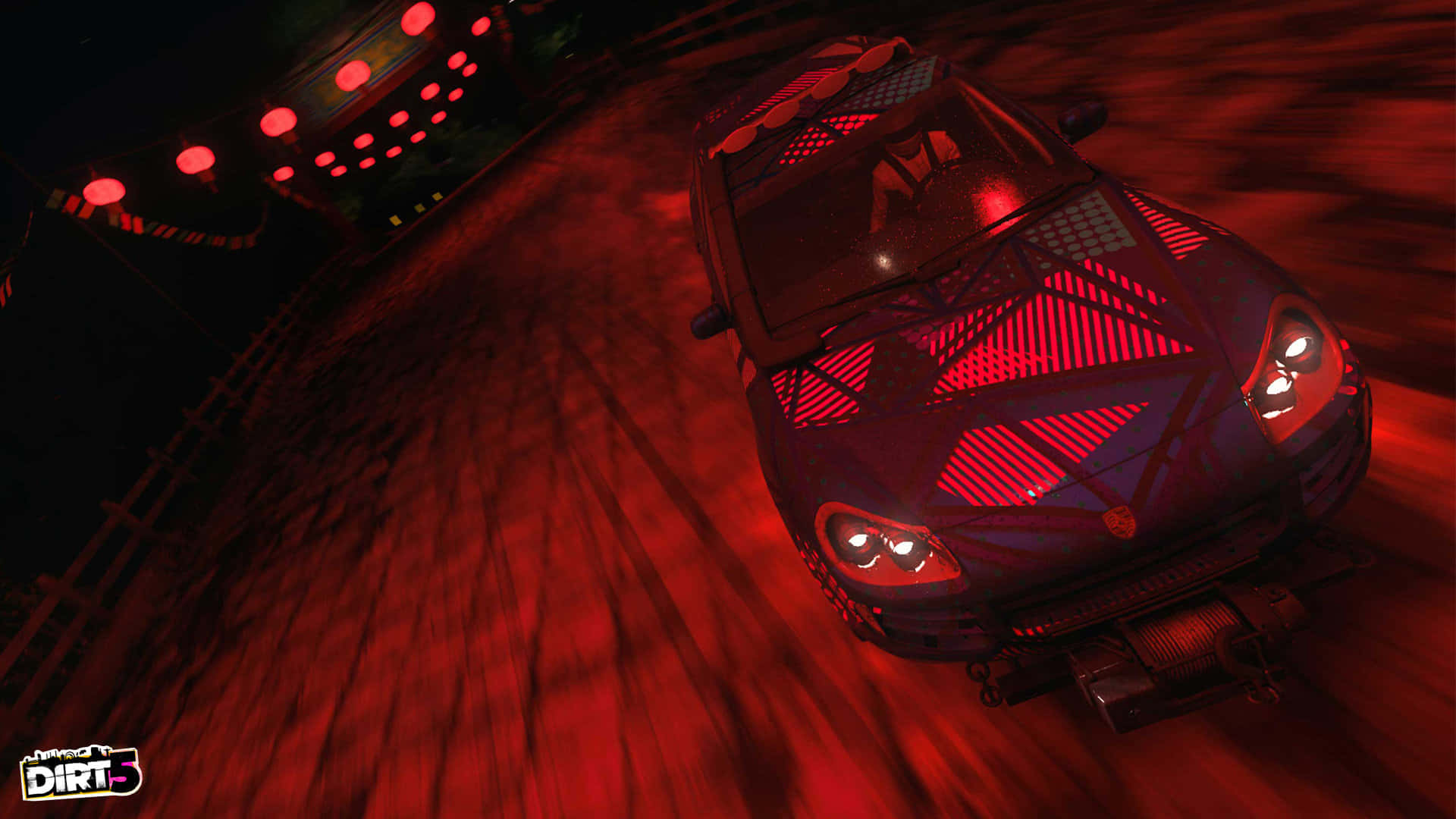 A Car Driving Down A Road At Night Background