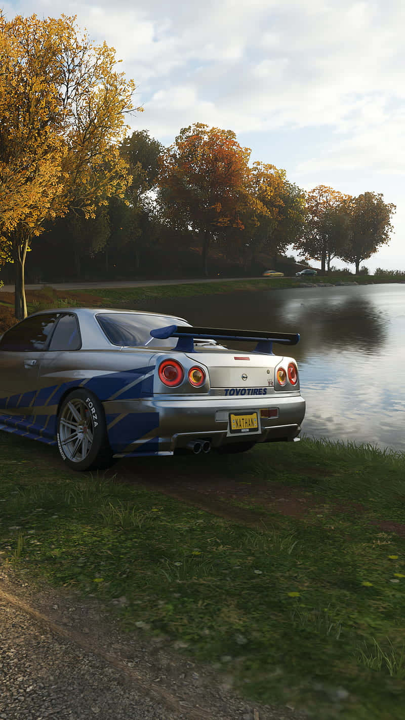 A Car Is Parked On The Side Of A Road Background