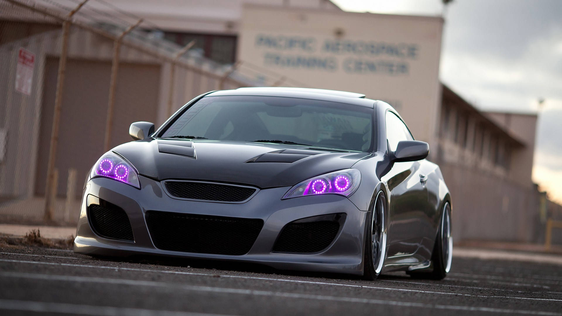 A Car With Purple Lights On It