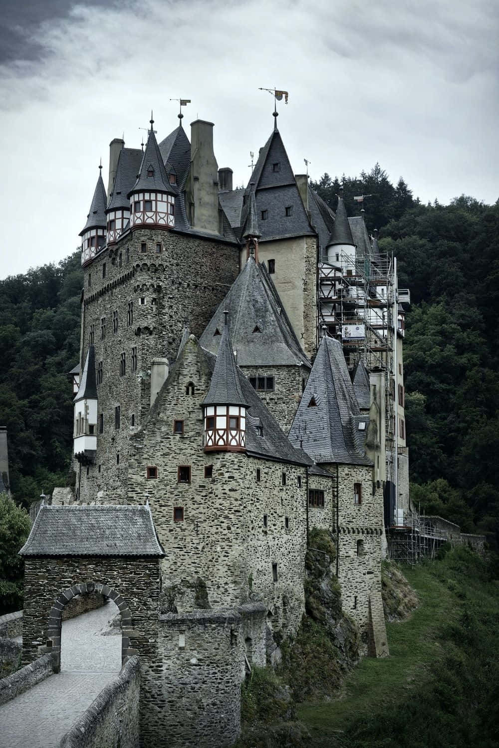 A Castle With A Large Tower On Top Of It