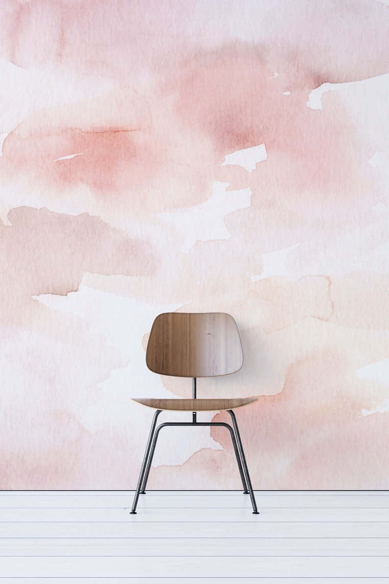 A Chair And A Pink Watercolor Wall Background