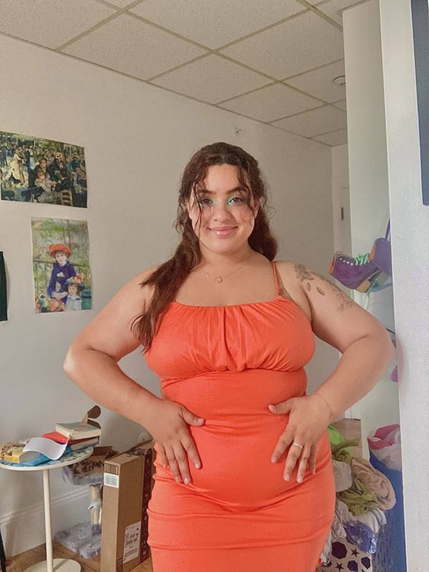 A Charming Chubby Teen Girl In A Colorful Orange Dress. Background