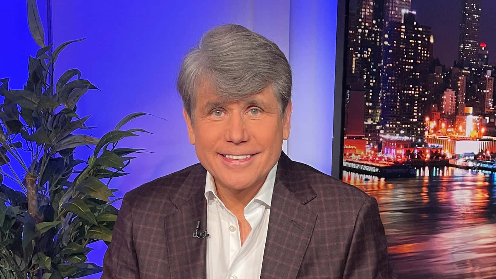 A Charming Portrait Of Rod Blagojevich With An Ear-to-ear Smile. Background