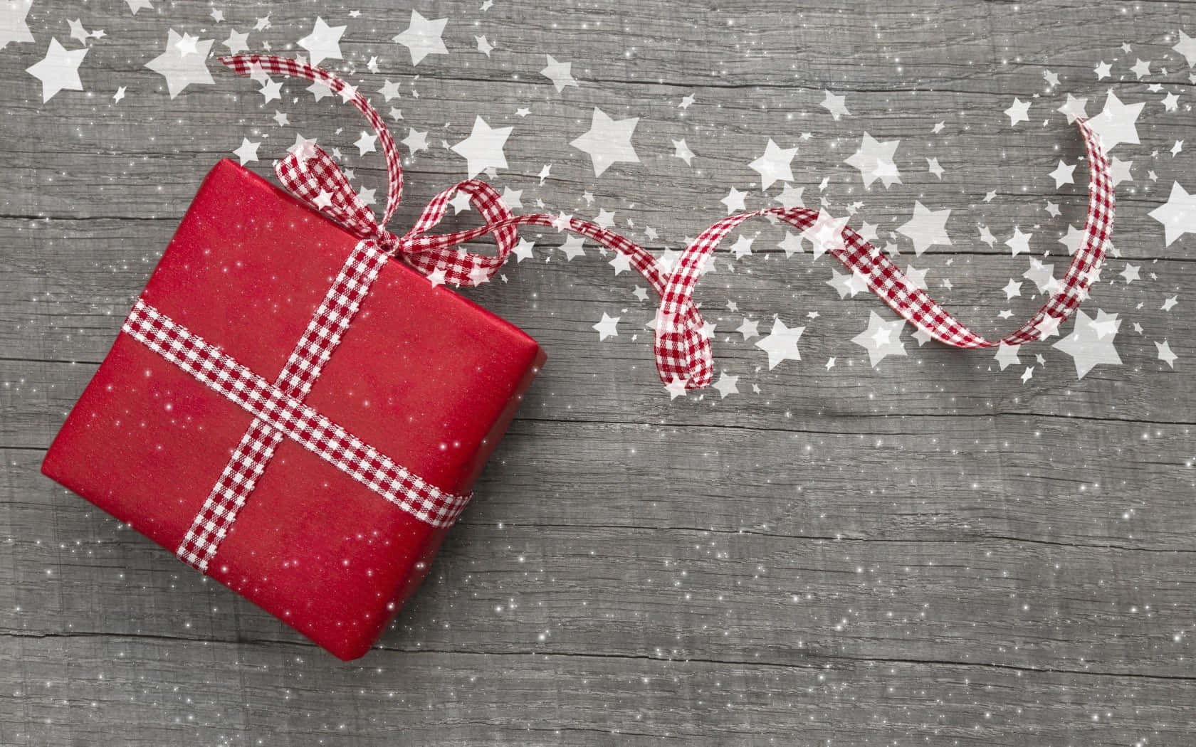 A Charming Red Gift Box Adorned With Twinkling Cute Stars. Background