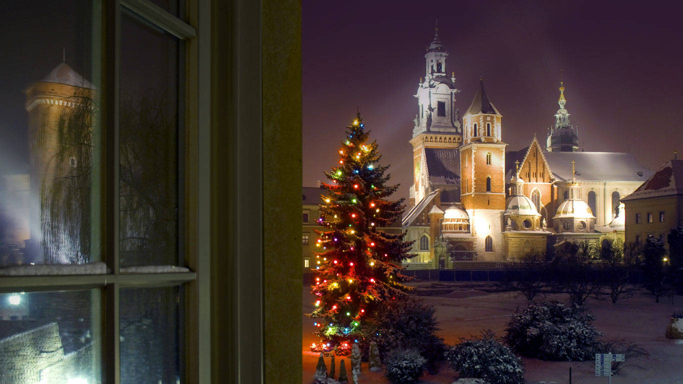 A Christmas Tree In Krakow Old Town Poland During Winter Background