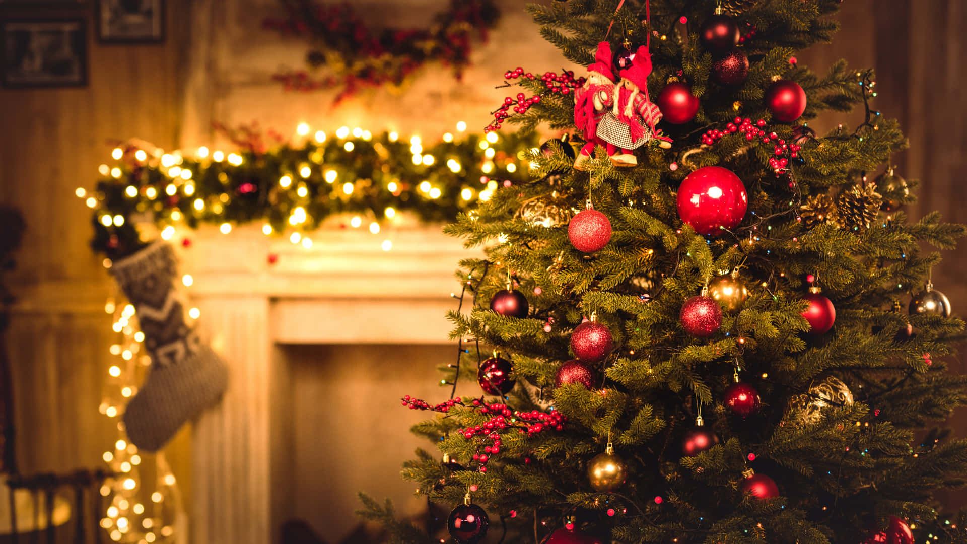 A Christmas Tree With Decorations In Front Of A Fireplace Background
